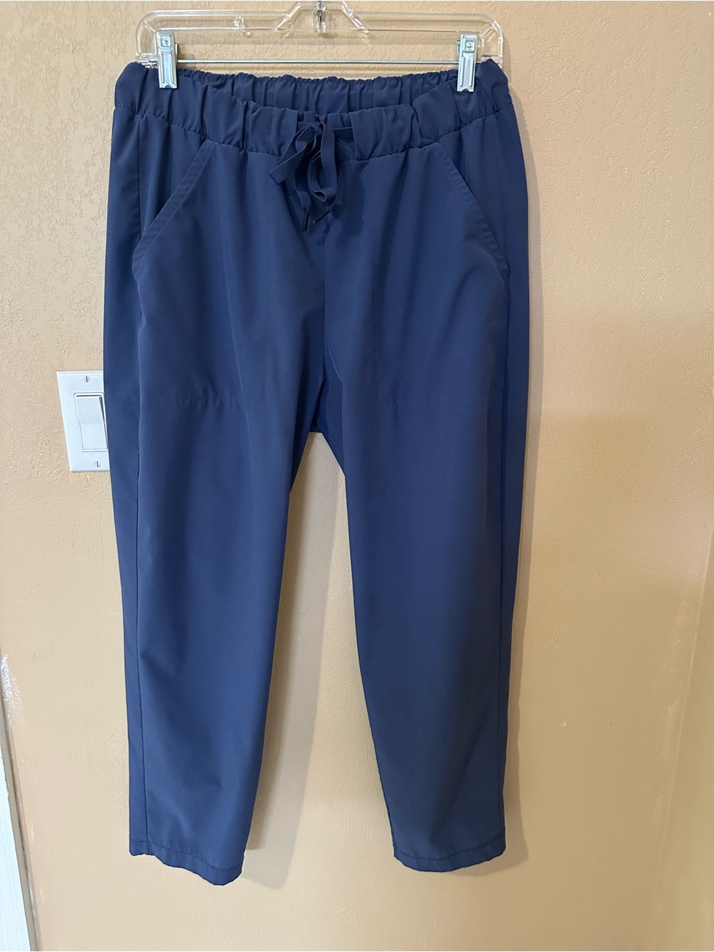 Under Armor Navy Elastic Waist Ankle length pants. Light weight.